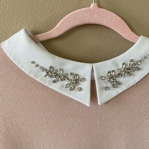 Pink sweater with rhinestones